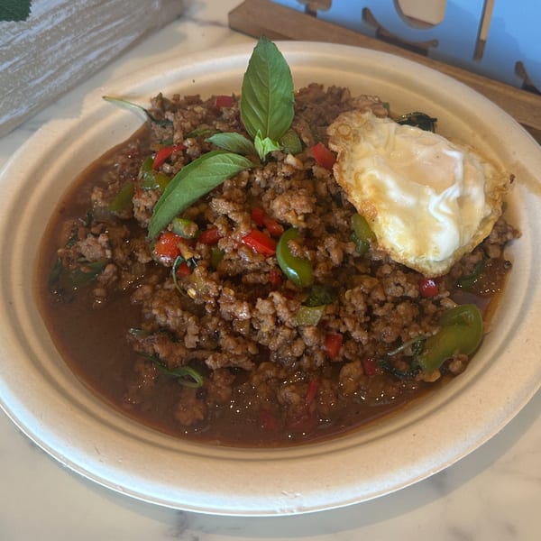 Gen Thai Street Food's Thai Basil dish with minced meat, peppers, basil, and a fried egg.